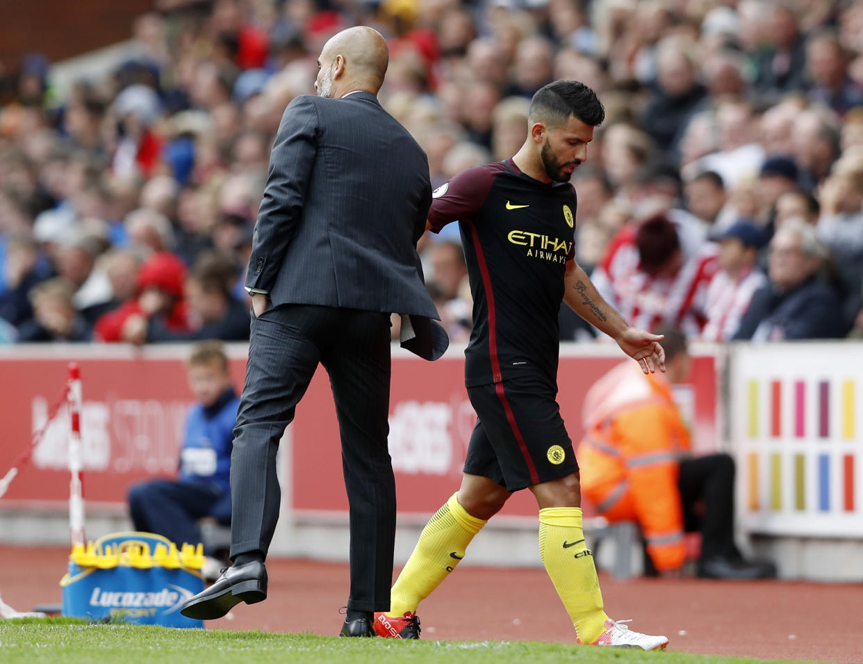 Britain Soccer Football - Stoke City v Manchester City - Premier League - bet365 Stadium - 20/8/16 Manchester City manager Pep Guardiola shakes the hand of Sergio Aguero as he is substituted off Action Images via Reuters / Carl Recine Livepic EDITORIAL USE ONLY. No use with unauthorized audio, video, data, fixture lists, club/league logos or &quot;live&quot; services. Online in-match use limited to 45 images, no video emulation. No use in betting, games or single club/league/player publications.  Please contact your account representative for further details.