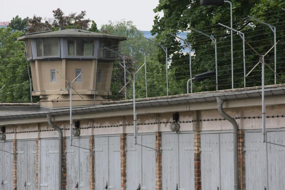 A guard tower stands at a former prison of the East German Stasi (Getty)