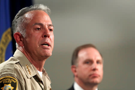 FILE PHOTO - Clark County Sheriff Joe Lombardo responds to a question during a media briefing at the Las Vegas Metro Police headquarters in Las Vegas, Nevada, U.S. October 3, 2017. Aaron Rouse, FBI Special Agent in Charge of the Las Vegas Division, looks on at right. REUTERS/Las Vegas Sun/Steve Marcus