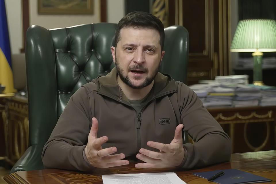 In this image from video provided by the Ukrainian Presidential Press Office, Ukrainian President Volodymyr Zelenskyy speaks from Kyiv, Ukraine, Wednesday, April 6, 2022. (Ukrainian Presidential Press Office via AP)