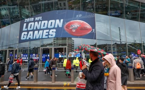 NFL football fans arrive at Tottenham Hotspur Stadium  - Credit: AP Photo/Alastair Grant