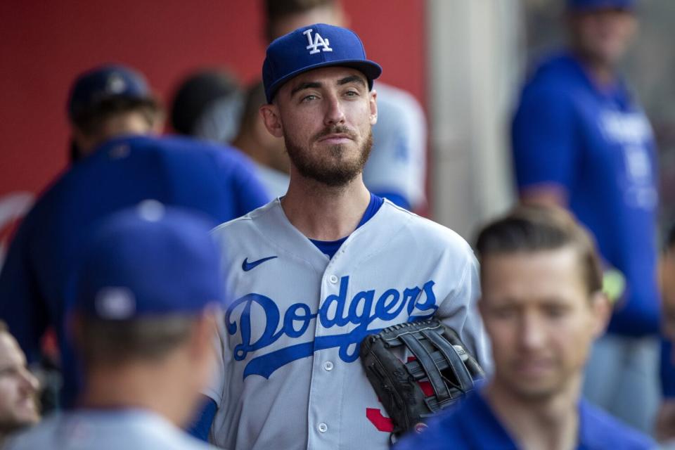 Cody Bellinger walks in the dugout before a game against the Angels in July.