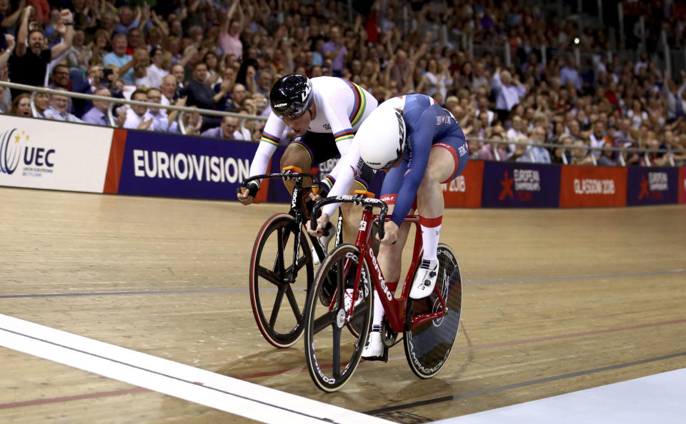 Netherland's Kirsten Wild, left, and Great Britain's Katie Archibald compete in the Women's Omnium III Elimination Race during the European Championships at the velodrome in Glasgow, Scotland, Monday Aug. 6, 2018.(John Walton/PA via AP)