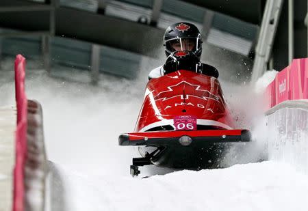 Feb 18, 2018; Pyeongchang, South Korea; Justin Kripps and Alexander Kopacz (CAN) in the men's 2-man bobsleigh during the Pyeongchang 2018 Olympic Winter Games at Olympic Sliding Centre. Mandatory Credit: Matt Kryger-USA TODAY Sports