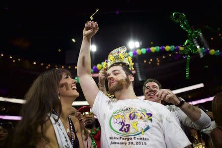 Patrick "Deep Dish" Bertoletti celebrates after winning the 23rd annual Wing Bowl at the Wells Fargo Center in Philadelphia, Pennsylvania January 30, 2015. REUTERS/Mark Makela