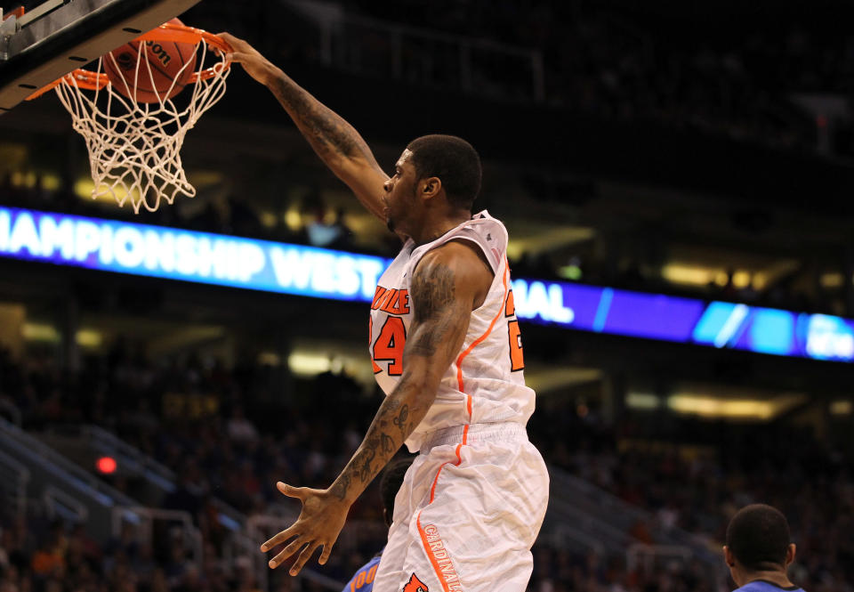 PHOENIX, AZ - MARCH 24: Chane Behanan #24 of the Louisville Cardinals dunks the ball in the first half against the Florida Gators during the 2012 NCAA Men's Basketball West Regional Final at US Airways Center on March 24, 2012 in Phoenix, Arizona. (Photo by Jamie Squire/Getty Images)