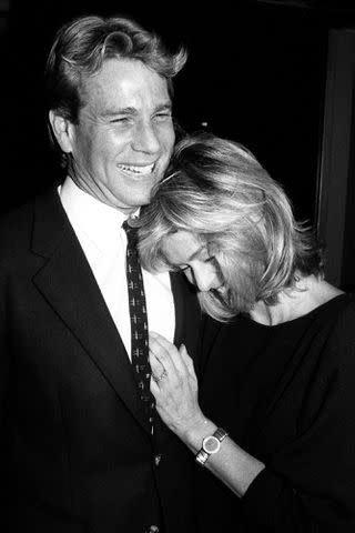 <p>John Roca/NY Daily News Archive via Getty</p> Ryan O'Neal and Farrah Fawcett on October 30.