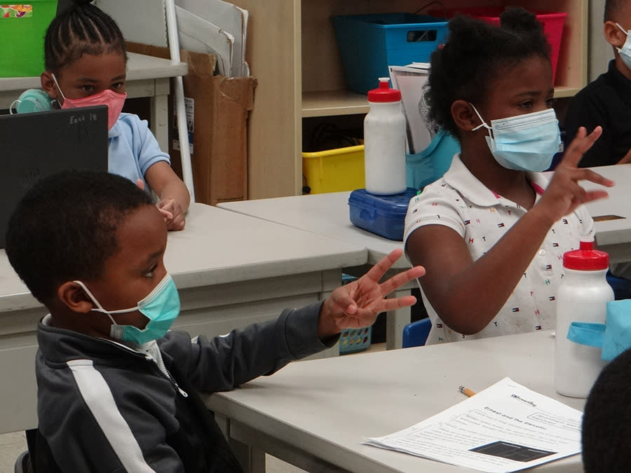 Students at East Academy have been able to sit closer to each other as CDC recommendations have relaxed and as more students return to in-person classes. (Patrick O’Donnell)