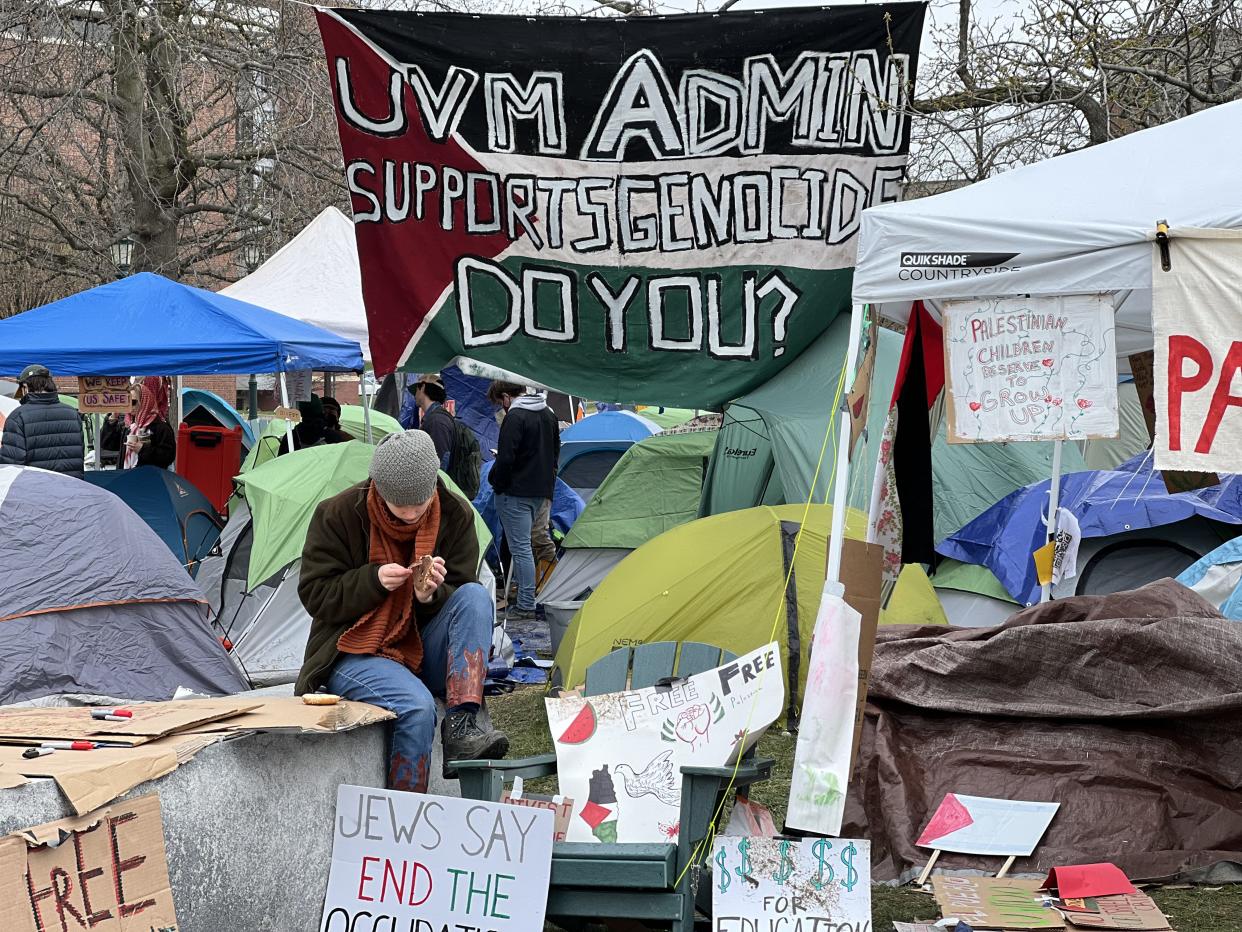 UVM student protesters erected pro-Palestine flags and signs throughout the encampment outside Andrew Harris Commons.