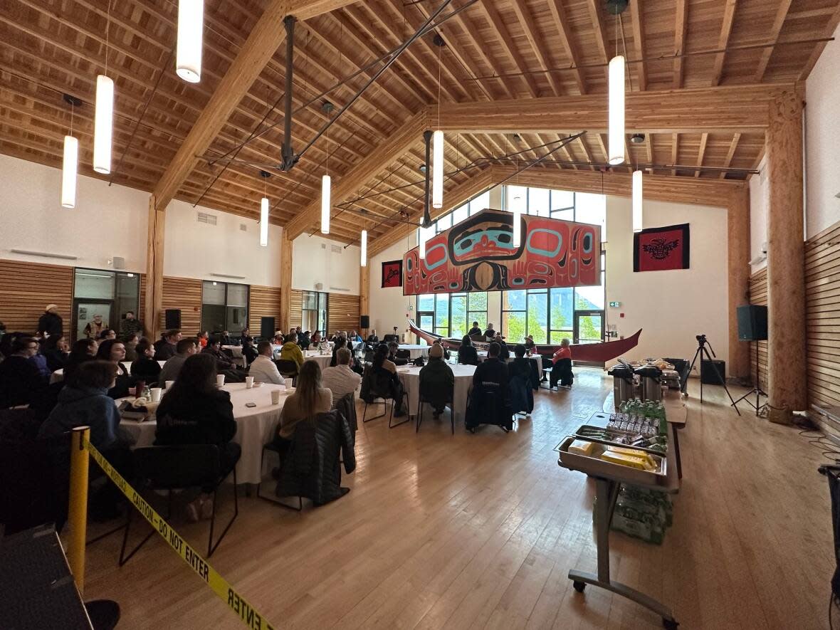 People gathered in Carcross, Yukon, on Monday to mark the beginning of work on a ground search at the former site of the Chooutla Indian Residential school. (Virginie Ann/CBC - image credit)
