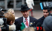 Defense attorney Tom Plunkett leaves the Hennepin County Public Safety Facility after his client, former Minneapolis police officer Mohamed Noor, made his first court appearance after being charged in the fatal shooting of Justine Ruszczyk Damond in Minneapolis, Minnesota, U.S. March 21, 2018. REUTERS/Eric Miller