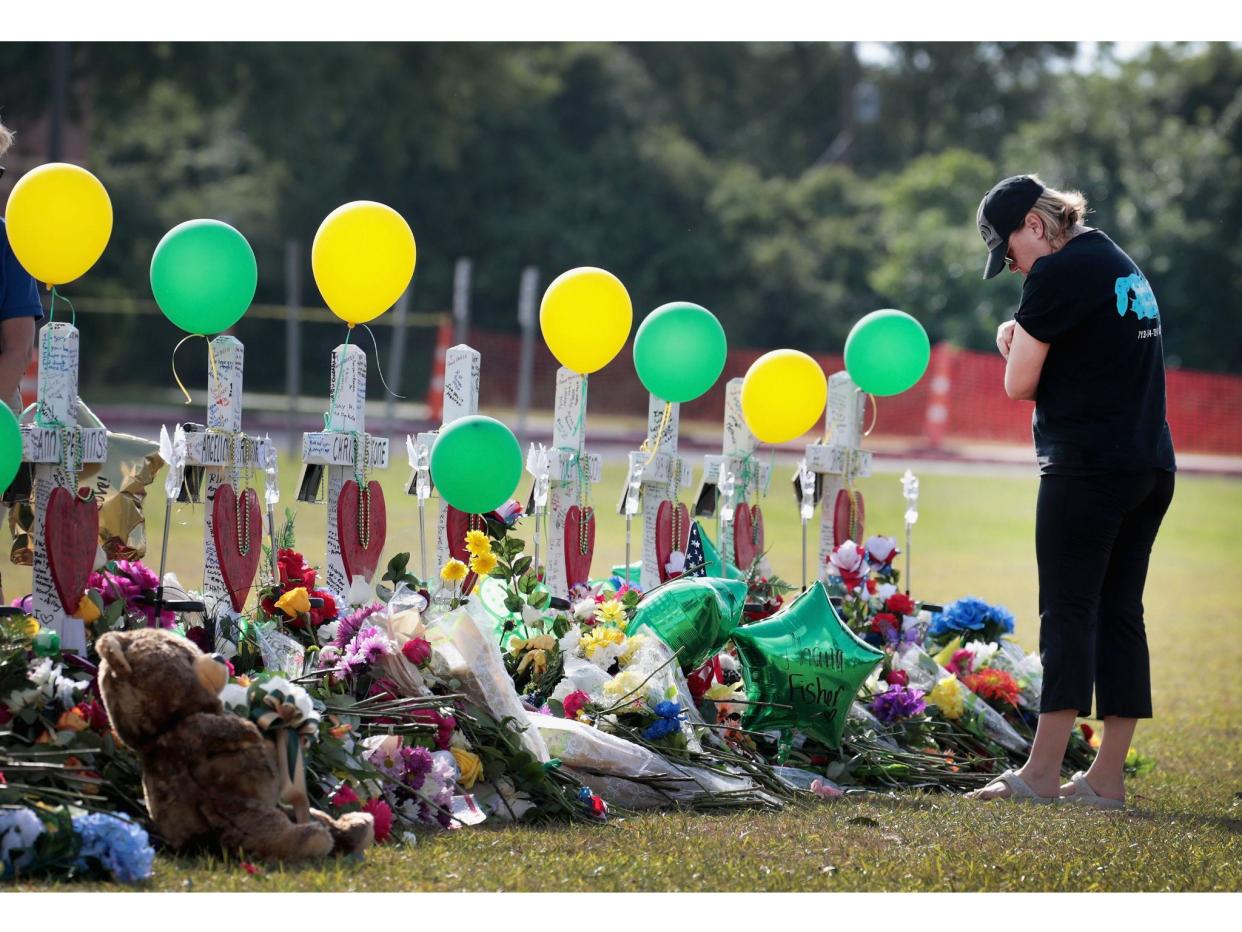 A memorial for the dead after the shooting in Santa Fe, Texas last week: Getty