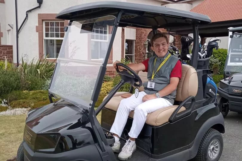 Oliver on golf buggy