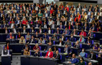 Lawmakers attend the first plenary session of the German parliament Bundestag after the elections, Berlin, Tuesday, Oct. 26, 2021. At right German President Frank-Walter Steinmeier. (Photo/Markus Schreiber)