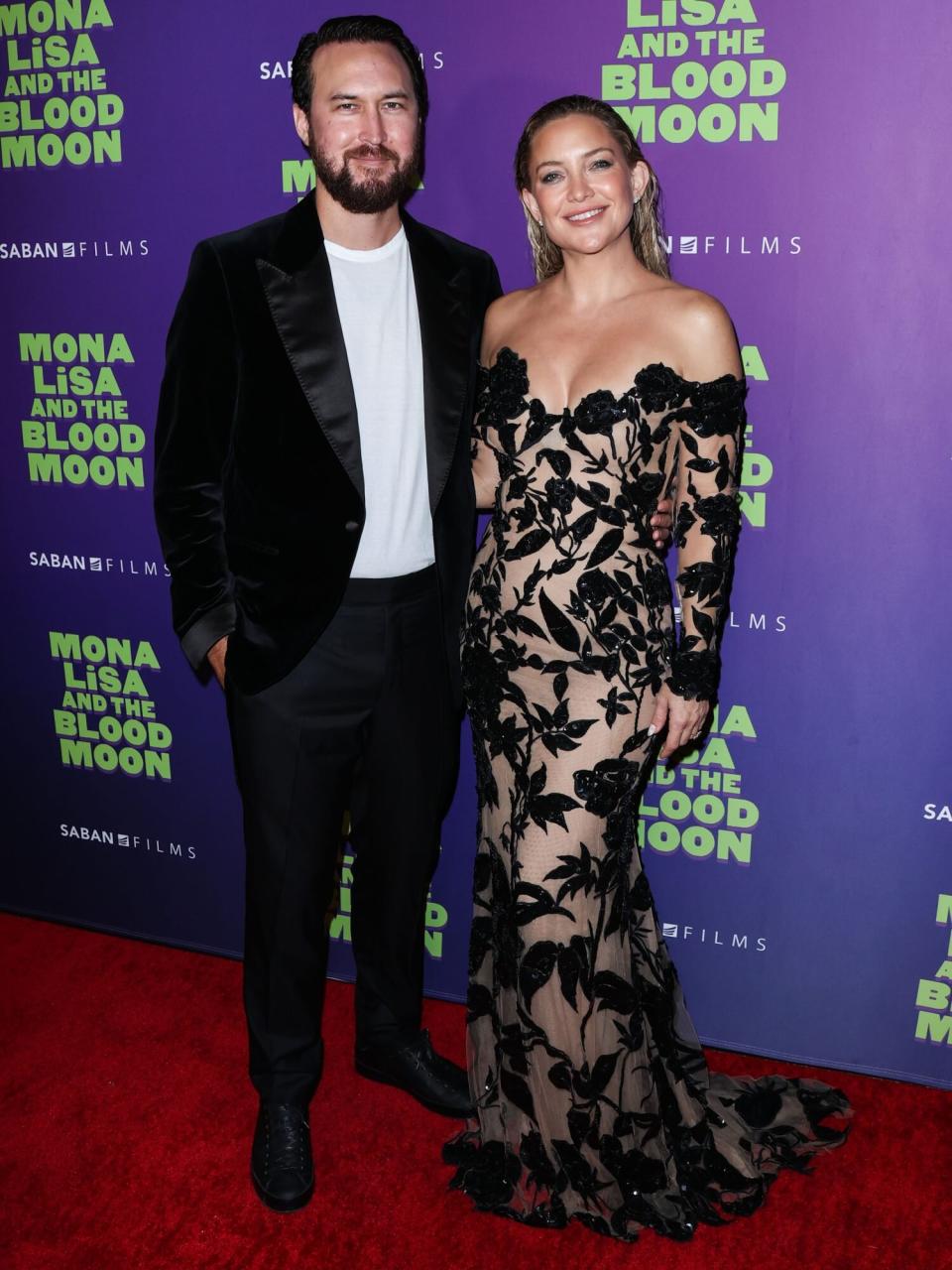 Danny Fujikawa and girlfriend/American actress Kate Hudson arrive at the Los Angeles Special Screening Of Saban Films' 'Mona Lisa And The Blood Moon'