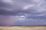 <p>“We had a storm with hail in front of us and flashing lightning, which was fantastic, but then we had this layer of <em>undulatus</em> clouds flowing across our view.” (Photo: Mike Olbinski/Caters News) </p>