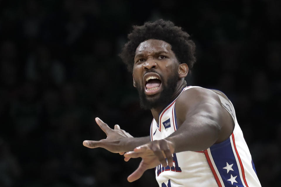 Philadelphia 76ers center Joel Embiid celebrates a made basket in the second half of an NBA basketball game against the Boston Celtics, Thursday, Dec. 12, 2019, in Boston. (AP Photo/Elise Amendola)