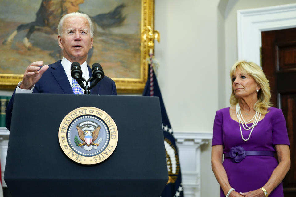 President Joe Biden speaks before signing into law S. 2938, the Bipartisan Safer Communities Act gun safety bill, in the Roosevelt Room of the White House in Washington, Saturday, June 25, 2022. First lady Jill Biden listens at right. (AP Photo/Pablo Martinez Monsivais)