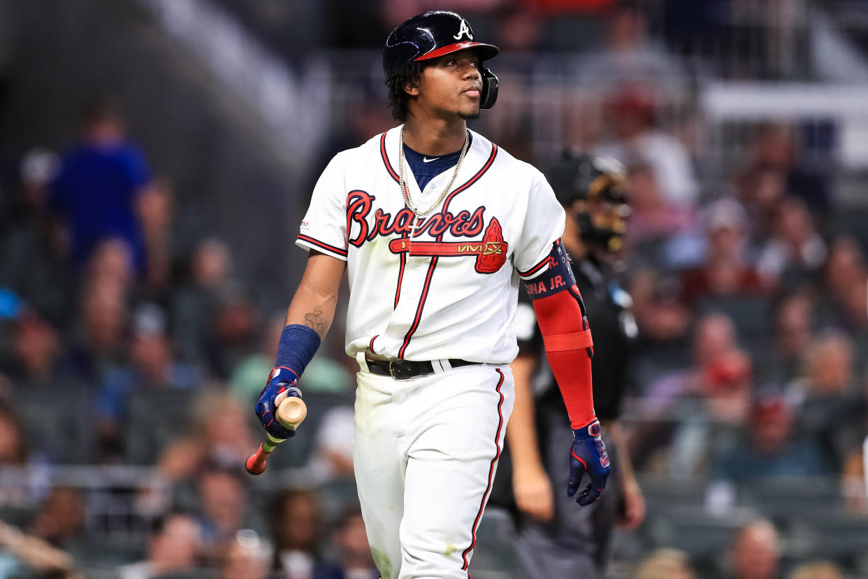 ATLANTA, GA - AUGUST 15: Ronald Acuna Jr. #13 of the Atlanta Braves walks to the dugout during the game against the New York Mets at SunTrust Park on August 15, 2019 in Atlanta, Georgia. (Photo by Carmen Mandato/Getty Images)