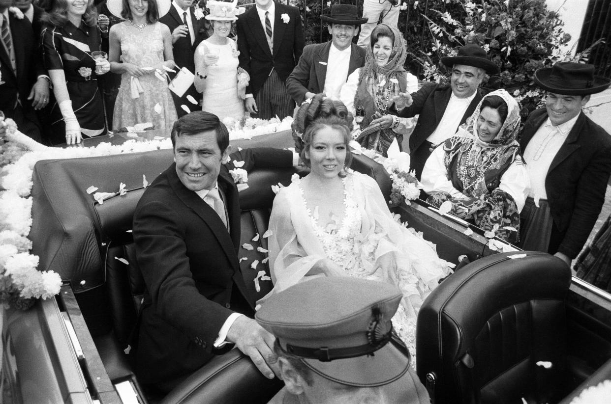 James Bond, played by George Lazenby, pictured marrying Tracey played by Diana Rigg during the filming of 'On Her Majesty's Secret Service' Estoril, Portugal, 30th April 1969. (Photo by Peter Stone/Mirrorpix/Getty Images)