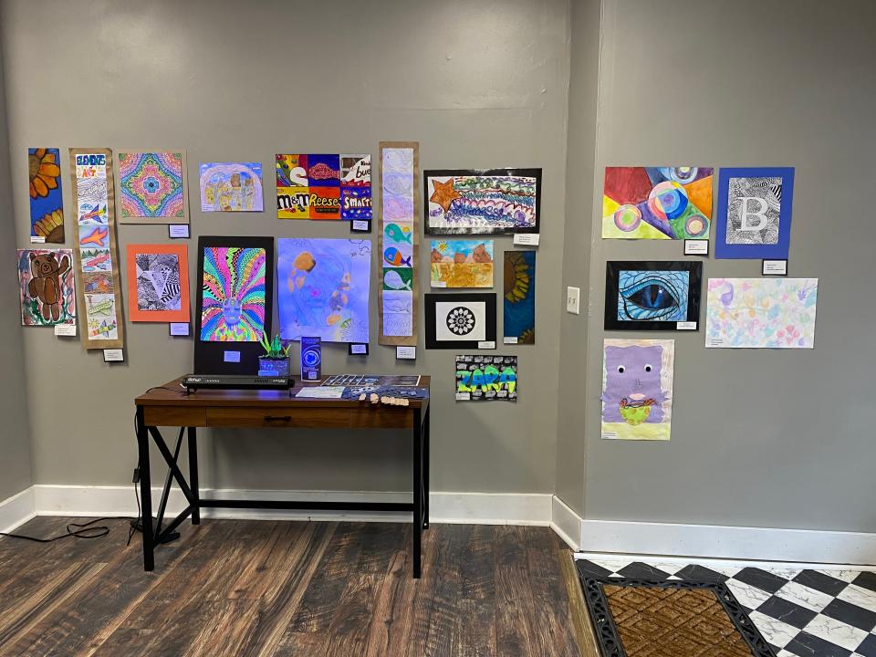 Student artwork created by Adrian Public Schools students was presented not just within the halls of the school buildings but also throughout the Adrian community. Pictured is a gallery of artwork recently on display within the Grata Domum Realty office in downtown Adrian.