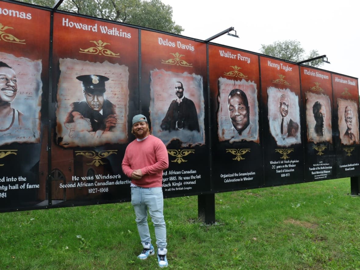 Artist Jermaine Baylis said almost every one of the 16 panels received some sort of touch up. (Jennifer La Grassa/CBC - image credit)