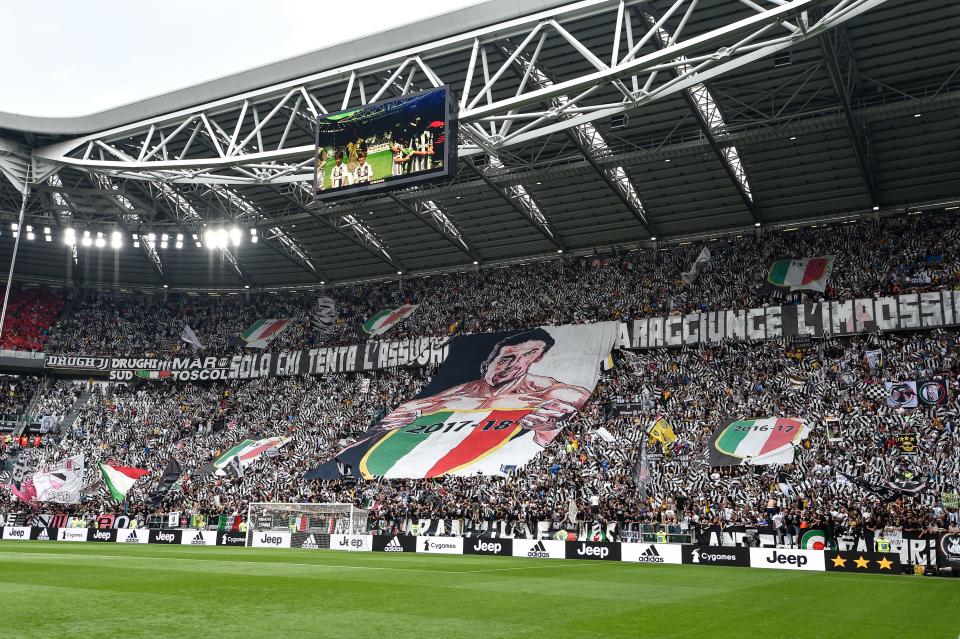 Gianluigi Buffon is greeted by fans with hugs and a banner before his final game at Juventus. (Getty)