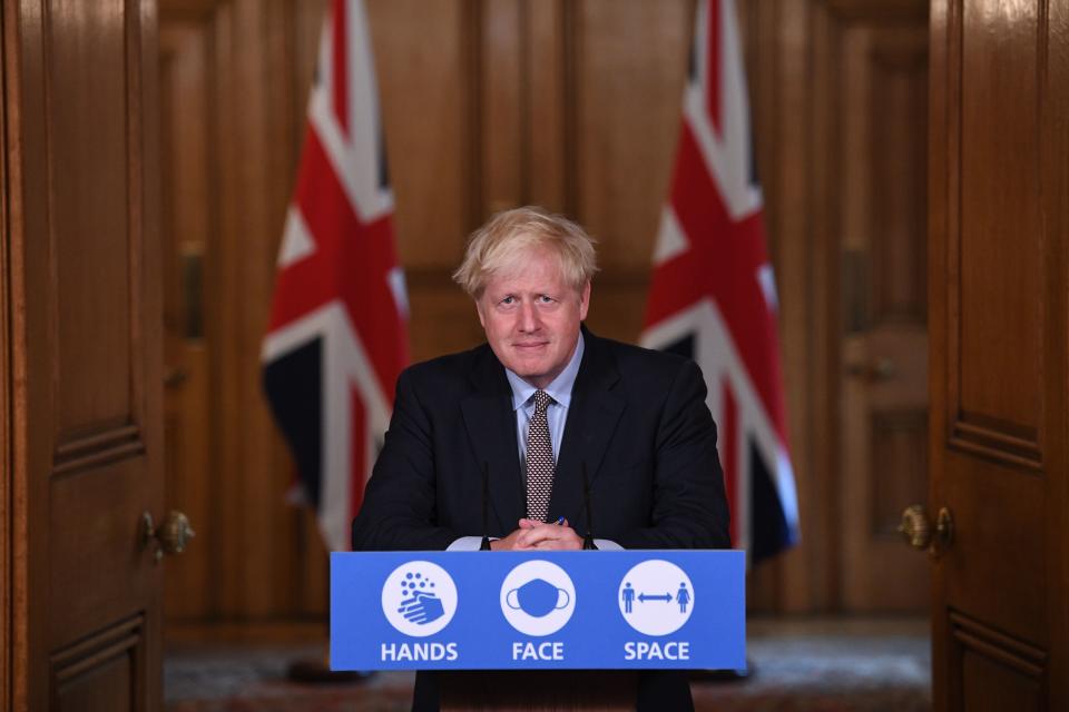 Britain's Prime Minister Boris Johnson speaks during a virtual press conference at Downing Street in central London on September 9, 2020 following an announcement of further restrictions on social gatherings in England due to an uptick in cases of the novel coronavirus. - The UK government on on September 9 sets out tighter rules on social gatherings to curb the spread of the coronavirus, with concern mounting at rising infection rates among the young. The law in England will change from next week to reduce the number of people who can gather socially from 30 to six, with some exemptions. (Photo by Stefan Rousseau / POOL / AFP) (Photo by STEFAN ROUSSEAU/POOL/AFP via Getty Images)