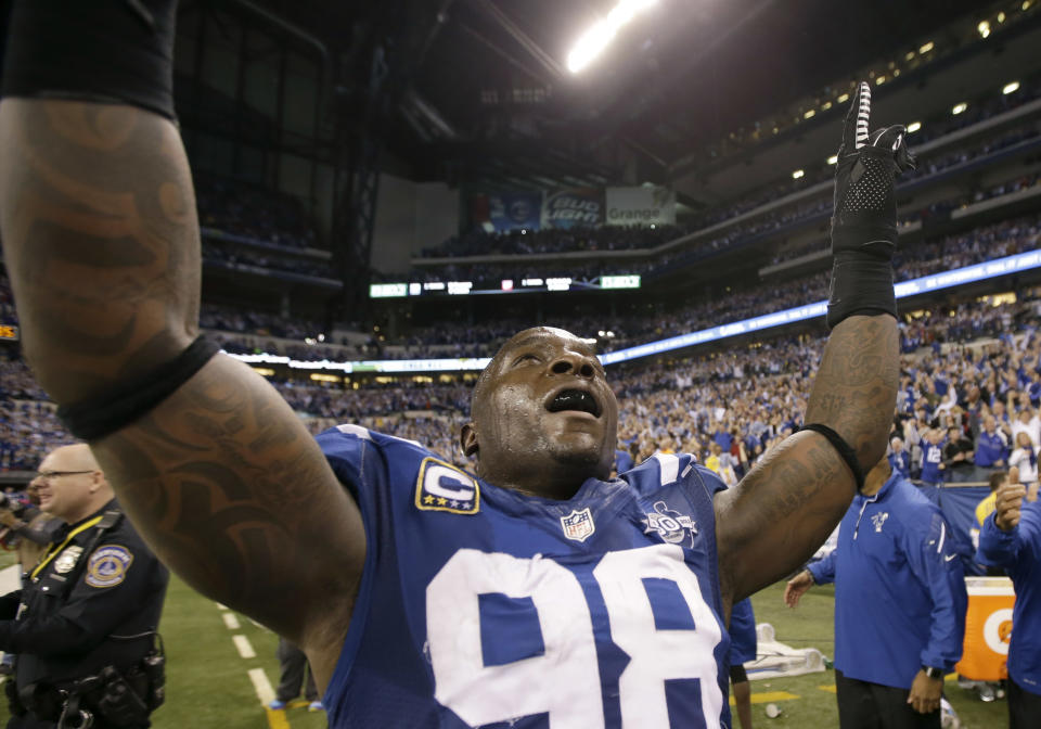 Indianapolis Colts' Robert Mathis (98) celebrates after an NFL wild-card playoff football game against the Kansas City Chiefs Saturday, Jan. 4, 2014, in Indianapolis. Indianapolis defeated Kansas City 45-44. (AP Photo/AJ Mast)