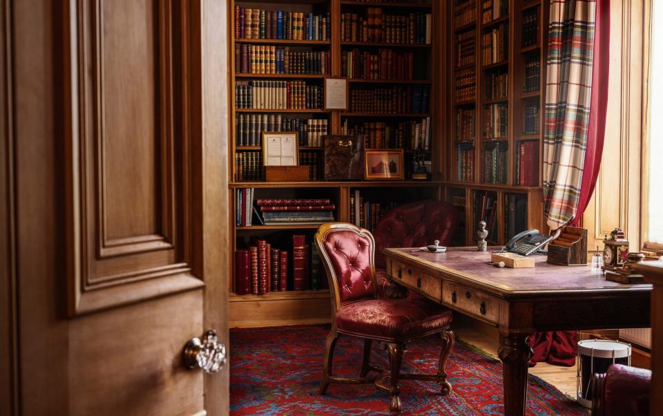 The library: A wooden letter tray, silver ink pot and blotter and what appears to be a diamond-studded clock adorn the King's desk. A military drum can be spotted beneath the desk. Among his shelves of books are editions of works by Virgil and Homer, and books on Scottish history, including Highland clans. The room features an ornament of a miniature replica of Royal Yacht Britannia inside a glass bottle