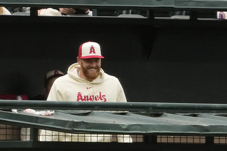 Los Angeles Angels pitcher Sam Bachman smiles in the bullpen during the first inning of a baseball game against the Miami Marlins Friday, May 26, 2023, in Anaheim, Calif. Bachman was promoted by the Los Angeles Angels yesterday, making him the first top-10 pick from the 2021 amateur draft to reach the majors. (AP Photo/Mark J. Terrill)