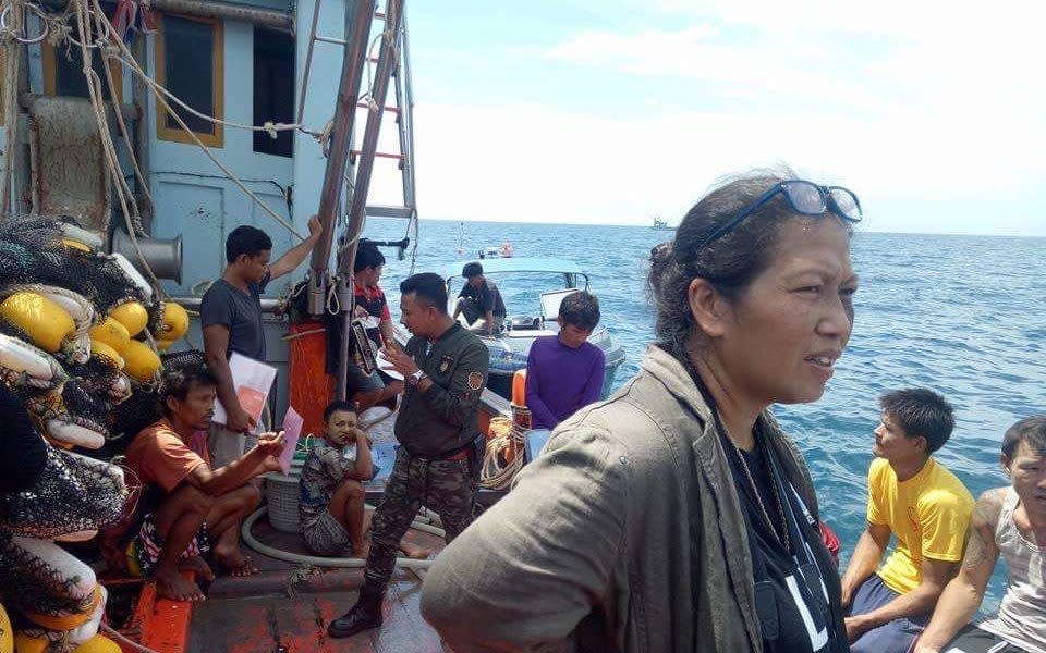 Patima Tungpuchyakul, co-founder of the Labour Protection Network, on a fishing boat - Labour Protection Network