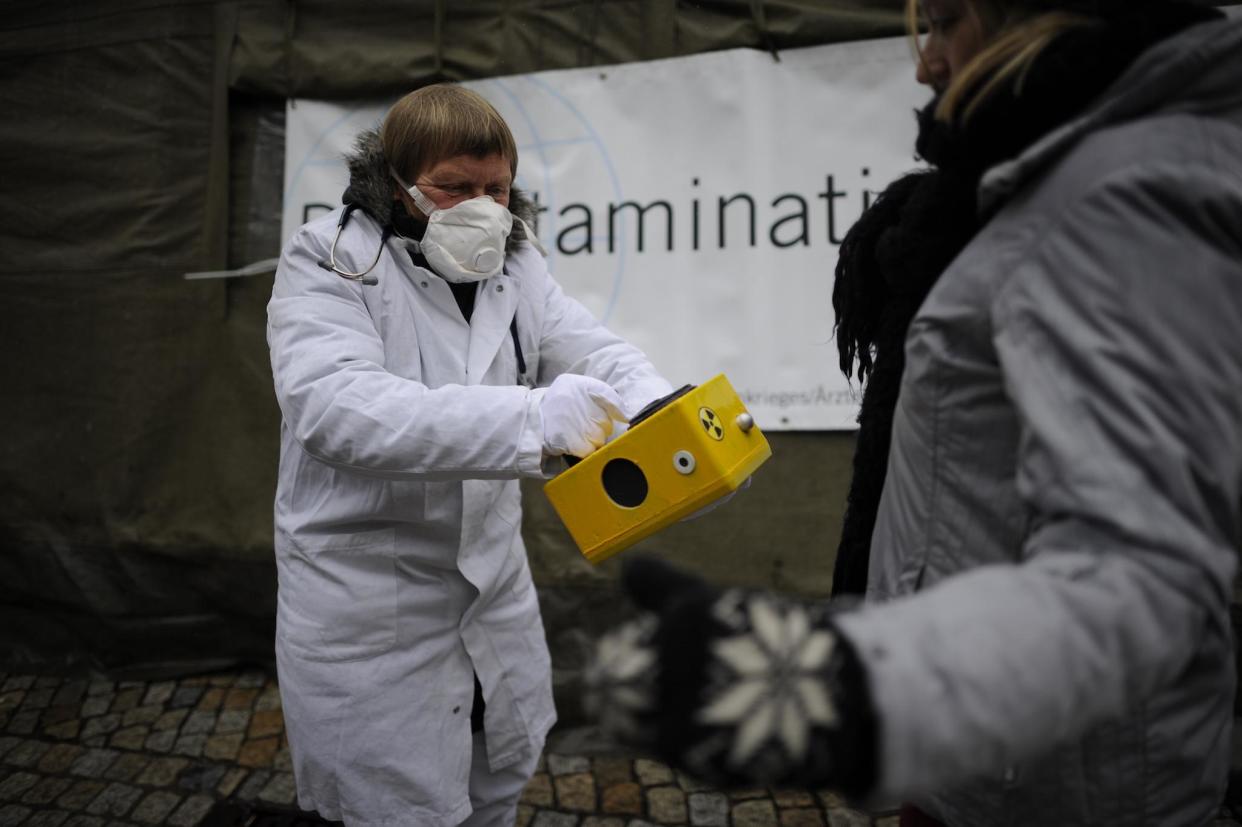 Anti-Nuclear protesters use a Geiger counter to measure the radioactive contamination of a citizen on March 9, 2013 in Hildesheim, Germany: Getty