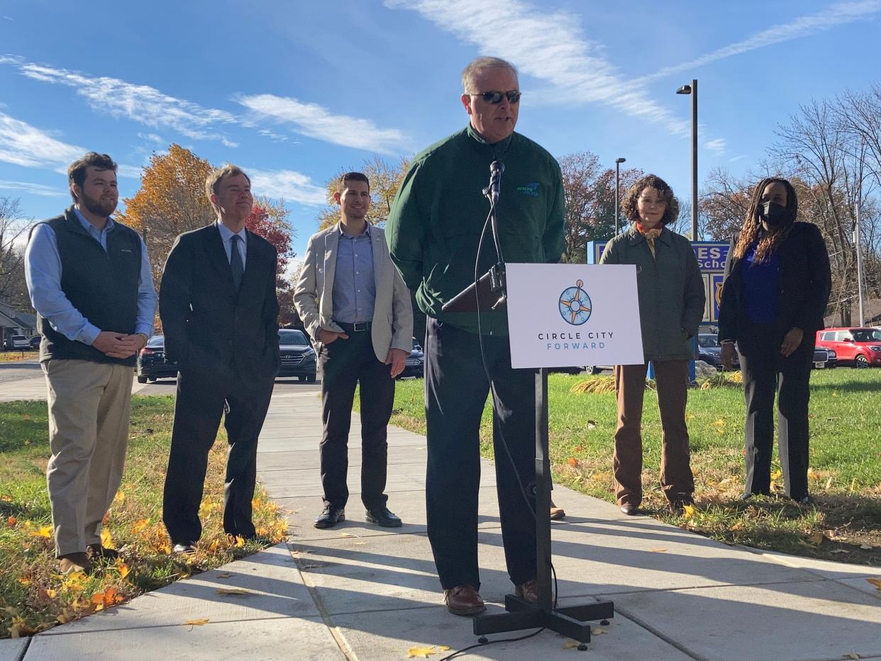 Dan Parker, director of the Department of Public Works, details the amount of reconstruction work 90 miles of Indianapolis residential streets will receive next year in a press conference Thursday, Nov. 18, 2021.