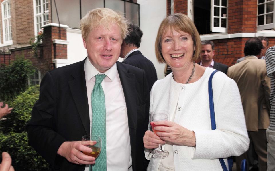 Boris Johnson, pictured with Harriet Harman MP, attends the Spectator Summer Party in July 2015 - Alan Davidson/Shutterstock 