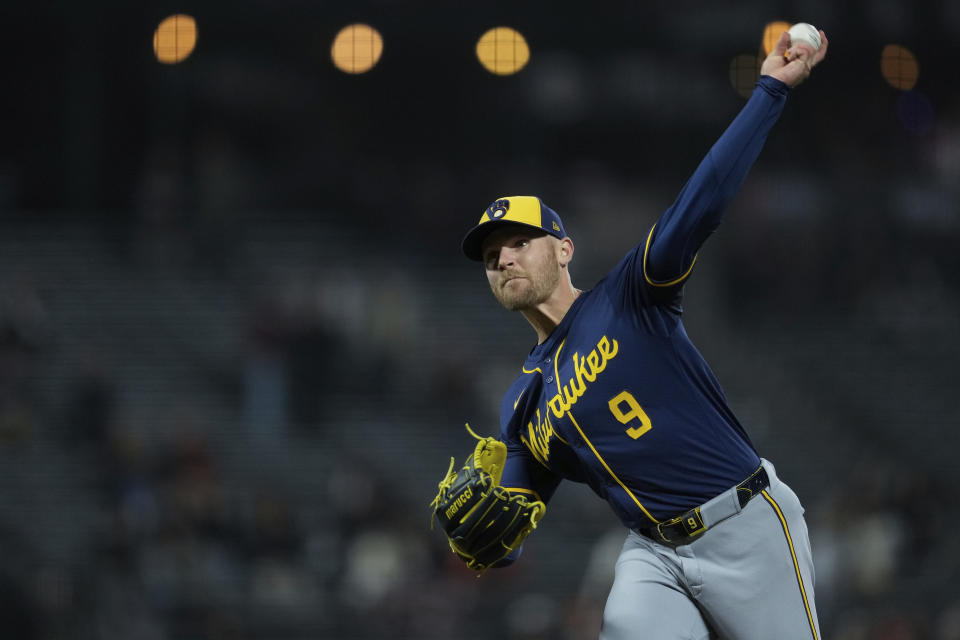 Milwaukee Brewers' Jake Bauers pitches to a San Francisco Giants batter during the eighth inning of a baseball game, Wednesday, Sept. 11, 2024, in San Francisco. (AP Photo/Godofredo A. Vásquez)