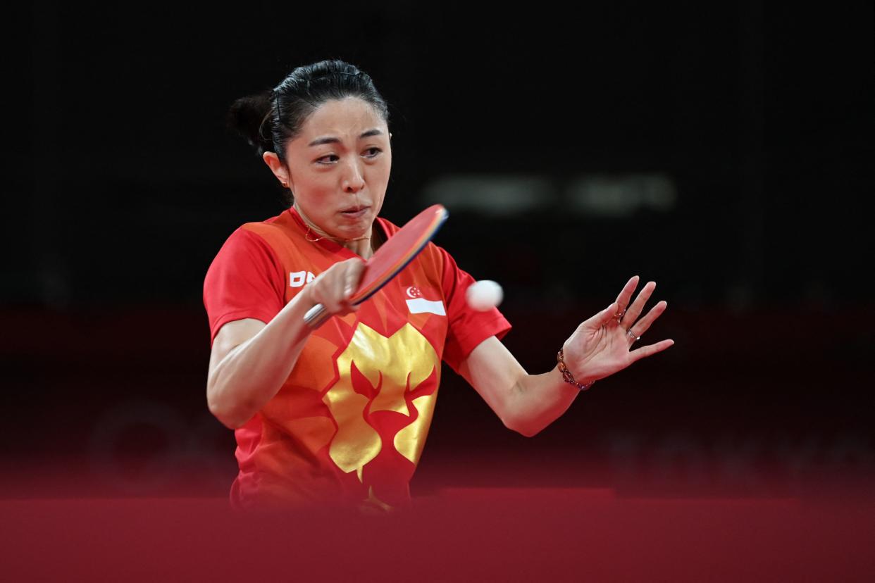 Singapore paddler Yu Mengyu competes against China's Chen Meng during their women's singles semi-finals table tennis match during the 2020 Tokyo Olympics. 
