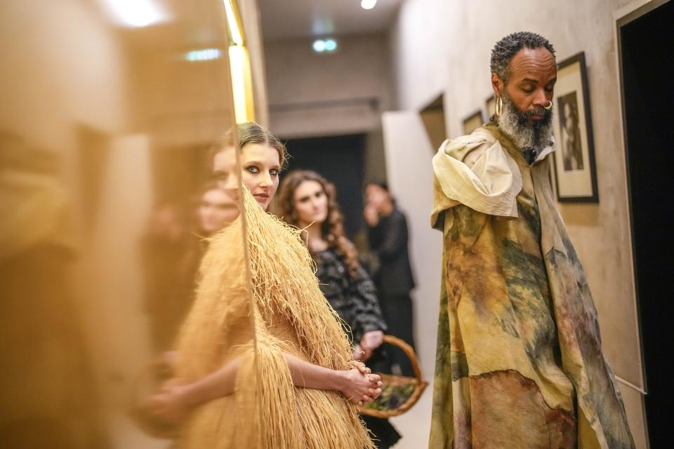 Models wait backstage prior to the Franck Sorbier Haute Couture Spring-Summer 2024 collection presented in Paris, Wednesday, Jan. 24, 2024. (AP Photo/Christophe Ena)