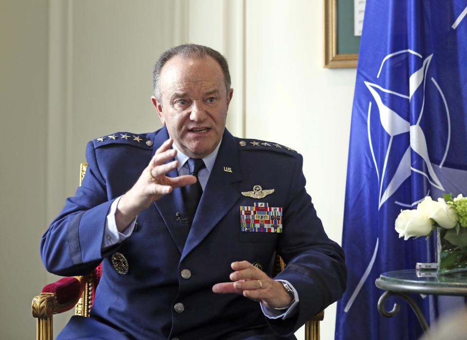 NATO Supreme Allied Commander Europe, U.S. Air Force General Philip Breedlove gestures during an interview with the Associated Press in Paris, Wednesday April 9, 2014, as he talks about his mission to formulate a plan to help protect and reassure NATO members nearest Russia. NATO’s top military commander in Europe, Breedlove is tasked with drafting countermoves to the Russian military threat against Ukraine. (AP Photo/Remy de la Mauviniere)