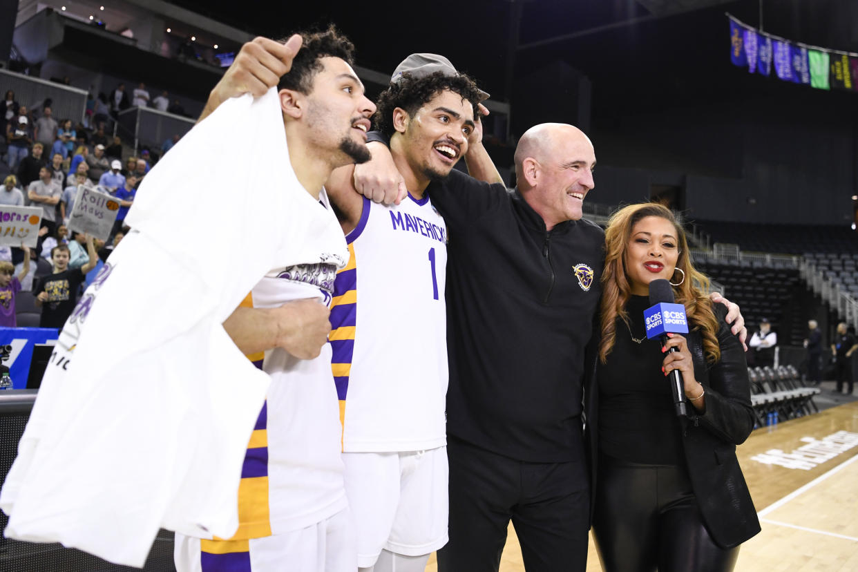 Minnesota State players Malik Willingham (far left), Kyreese Willingham (1) and head coach Matt Margenthaler are interviewed after winning the NCAA Division II championship on Saturday at the Ford Center in Evansville, Indiana. (Photo by Michael Allio/Icon Sportswire via Getty Images)