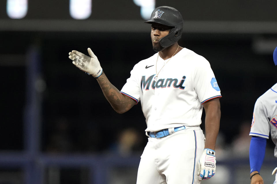 Miami Marlins' Jorge Soler reacts after hitting a double against the New York Mets during the third inning of a baseball game Tuesday, Sept. 19, 2023, in Miami. (AP Photo/Lynne Sladky)