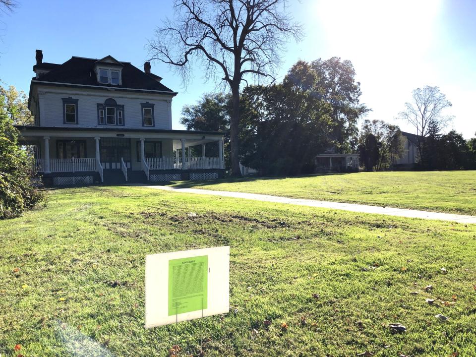 This Woods Services building on Bellevue Avenue in Langhorne is on property that Toll Brothers plans for a townhome community. This historic home and two others are expected to remain. A notice about an upcoming zoning hearing Oct. 26 is shown in front.