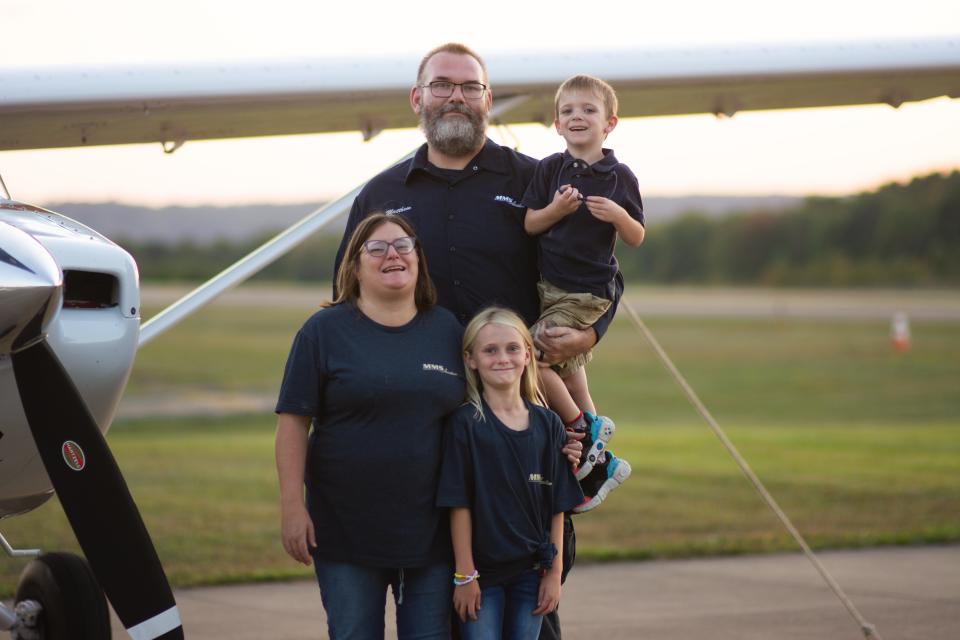 Matthew Woods of MMS Aviation with his wife, Melanie, and their children, Isaac and Monica.