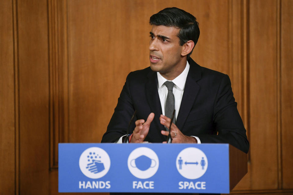 Britain's Chancellor of the Exchequer Rishi Sunak speaks, during a coronavirus briefing in Downing Street, London, Monday, Oct. 12, 2020. (Toby Melville/Pool Photo via AP)