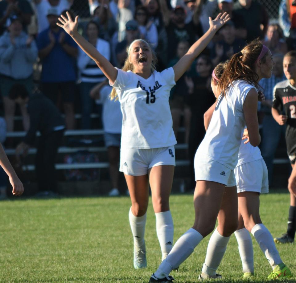 Gull Lake's Nyla Stanley celebrates after beating No. 1 Marshall in this Division 2 girls soccer district championship game at Marshall High School on Friday.