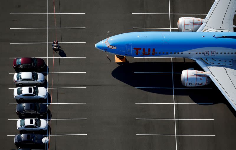 FILE PHOTO: A grounded TUI Airways Boeing 737 MAX aircraft is seen parked at a Boeing employee parking lot at Boeing Field in Seattle