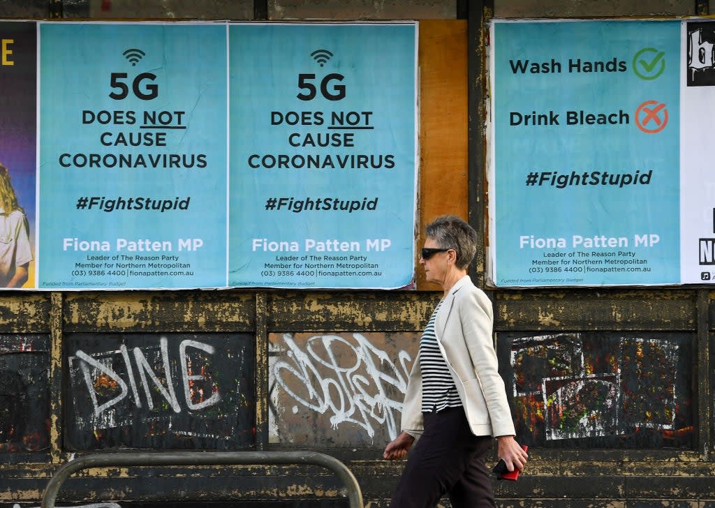 <p>Public service announcement posters in Australia, negating a conspiracy that 5G telecommunications technology causes the coronavirus</p> (AFP via Getty Images)