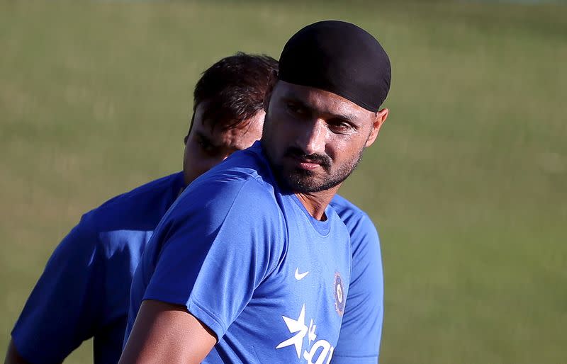 India’s Singh and Mishra attend a practice session ahead of their first Twenty-20 cricket match against South Africa in Dharamsala