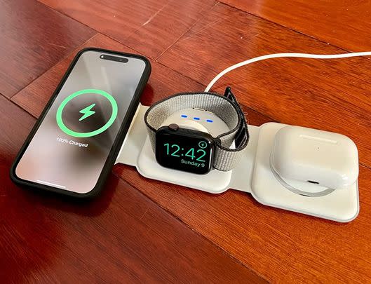 A three-in-one magnetic wireless charger that folds up compactly