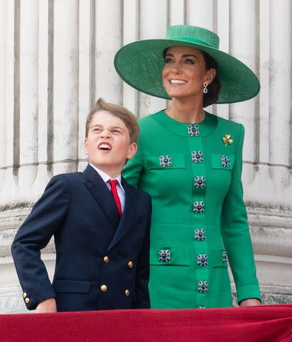 <p>Samir Hussein/WireImage</p> Prince George and Kate Middleton on the balcony during Trooping the Colour in June.